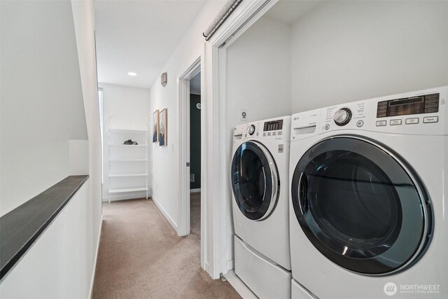 917 29th Ave S, Seattle, WA 98144 - washroom with light carpet and washer and clothes dryer
