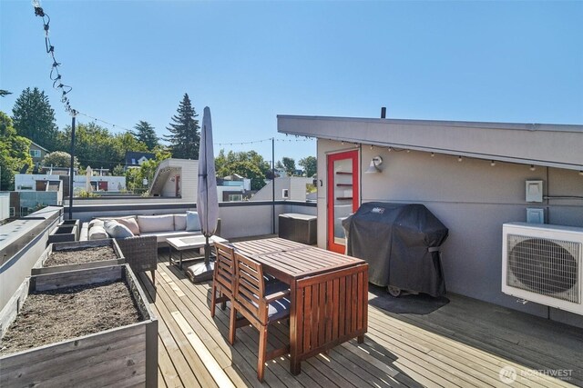 917 29th Ave S, Seattle, WA 98144 - wooden deck featuring grilling area, a vegetable garden, an outdoor living space, and outdoor dining area