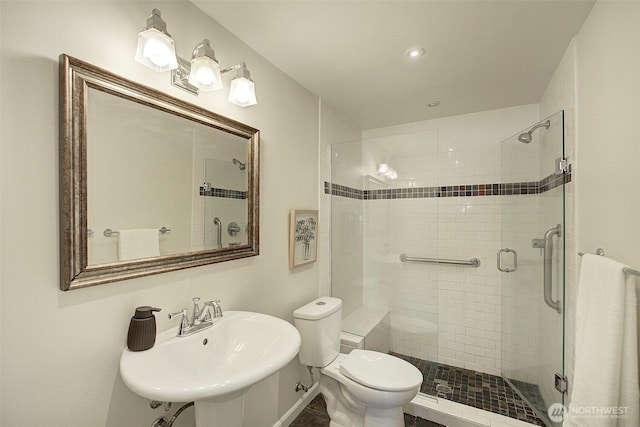 919 2nd Ave W Unit 601, Seattle, WA 98119 - full bath with a sink, toilet, and a shower stall
