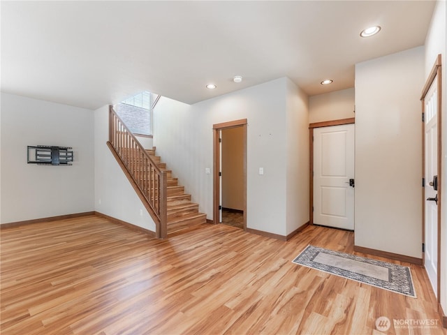 2452 NW Columbia Ave Unit 25, East Wenatchee, WA 98802 - foyer featuring light wood-type flooring, stairway, baseboards, and recessed lighting