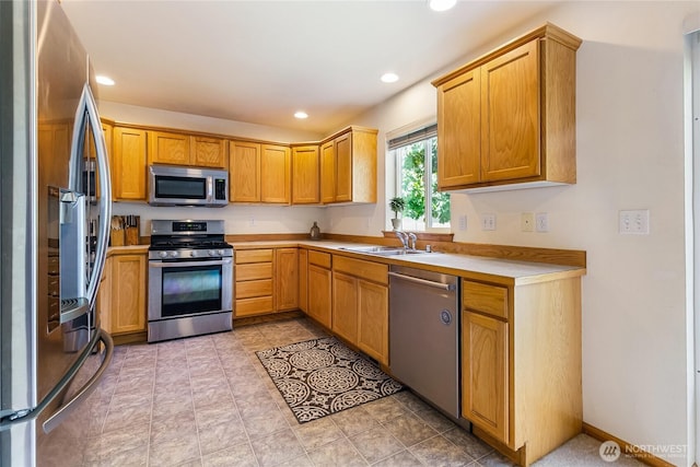 4155 Aurora Loop, Bellingham, WA 98226 - kitchen featuring appliances with stainless steel finishes, light countertops, and recessed lighting