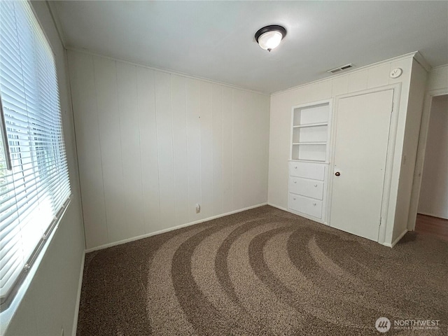 425 Henry St, Shelton, WA 98584 - unfurnished bedroom featuring carpet and baseboards
