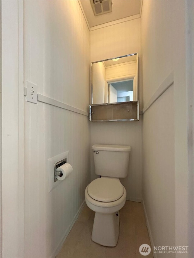 425 Henry St, Shelton, WA 98584 - bathroom with toilet, tile patterned floors, and baseboards