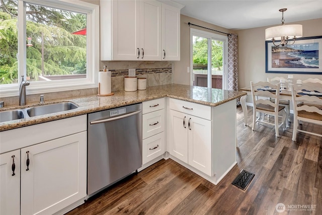 13303 53rd Ave SE, Everett, WA 98208 - kitchen featuring dishwasher, dark wood-style flooring, a peninsula, white cabinets, and a chandelier