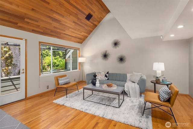 4142 52nd Ave SW, Seattle, WA 98116 - living area featuring wood finished floors, recessed lighting, and vaulted ceiling