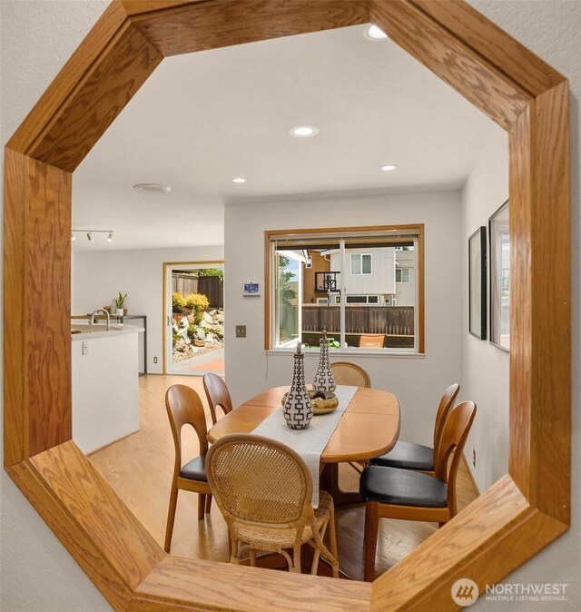 4142 52nd Ave SW, Seattle, WA 98116 - dining area with wood finished floors and recessed lighting