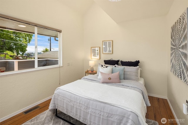 4142 52nd Ave SW, Seattle, WA 98116 - bedroom with wood finished floors and lofted ceiling