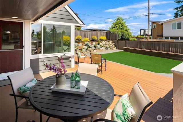 4142 52nd Ave SW, Seattle, WA 98116 - wooden deck featuring a fenced backyard and outdoor dining space