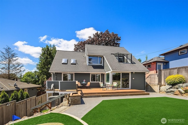 4142 52nd Ave SW, Seattle, WA 98116 - rear view of house featuring a wooden deck and roof with shingles