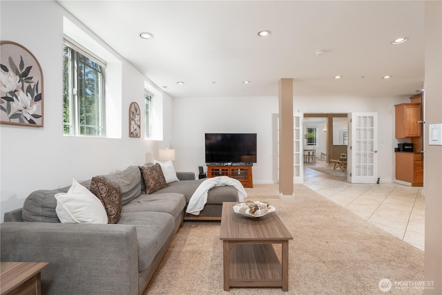 19678 Marine View Dr SW, Normandy Park, WA 98166 - living area with light tile patterned floors, recessed lighting, french doors, light colored carpet, and baseboards