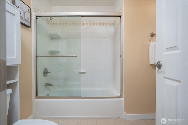19678 Marine View Dr SW, Normandy Park, WA 98166 - bathroom with shower / bath combination with glass door, tile patterned flooring, toilet, and baseboards