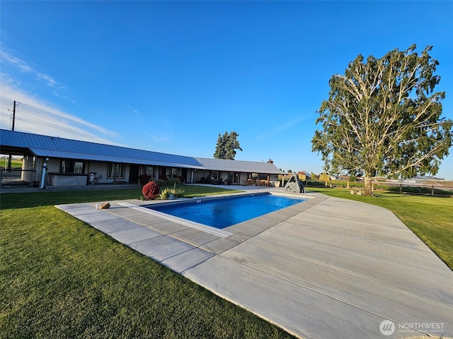 8708 Rd K Rd NE, Moses Lake, WA 98837 - outdoor pool featuring a lawn and a patio area