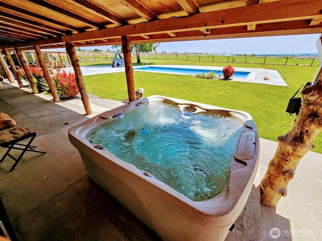 8708 Rd K Rd NE, Moses Lake, WA 98837 - view of patio / terrace featuring a hot tub and a swimming pool