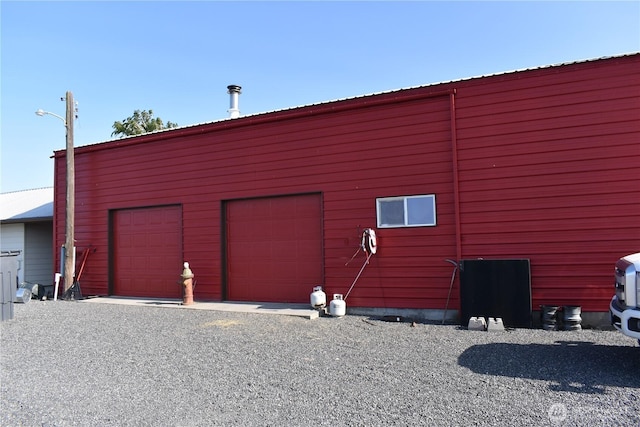 8708 Rd K Rd NE, Moses Lake, WA 98837 - view of side of property featuring an outbuilding and a detached garage