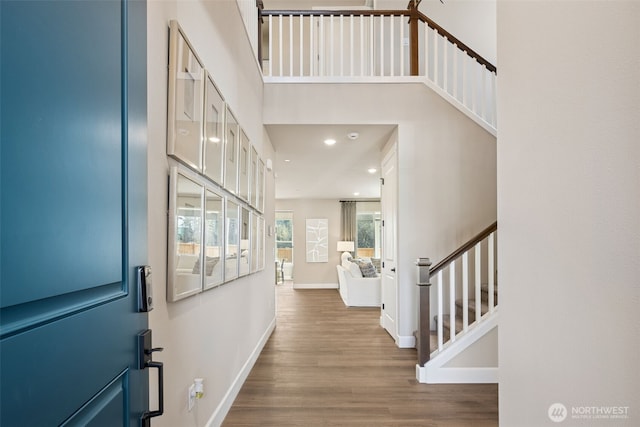 13920 181st St E Unit 64, Puyallup, WA 98374 - foyer entrance featuring wood finished floors, stairway, baseboards, and recessed lighting
