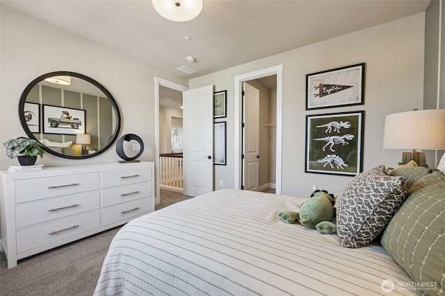 13920 181st St E Unit 64, Puyallup, WA 98374 - bedroom with dark carpet and a walk in closet
