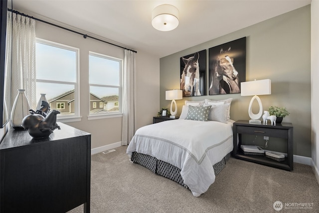 13920 181st St E Unit 64, Puyallup, WA 98374 - carpeted bedroom featuring multiple windows and baseboards