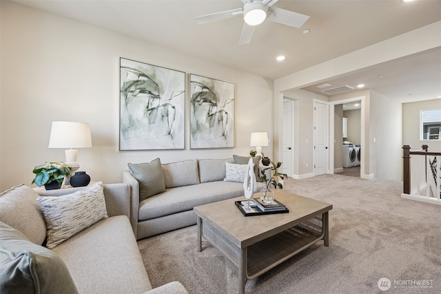13920 181st St E Unit 64, Puyallup, WA 98374 - carpeted living area with independent washer and dryer, recessed lighting, a ceiling fan, and baseboards