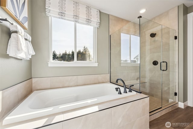 13920 181st St E Unit 64, Puyallup, WA 98374 - full bath featuring a garden tub, a shower stall, and wood finished floors