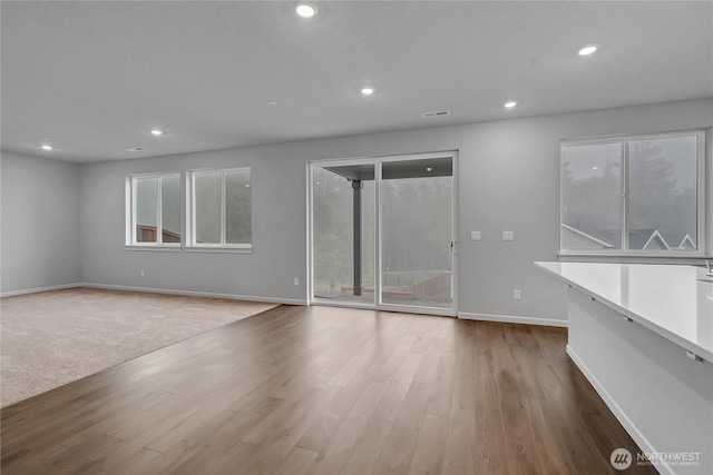 2609 S 7th Way, Ridgefield, WA 98642 - empty room with baseboards, recessed lighting, and wood finished floors