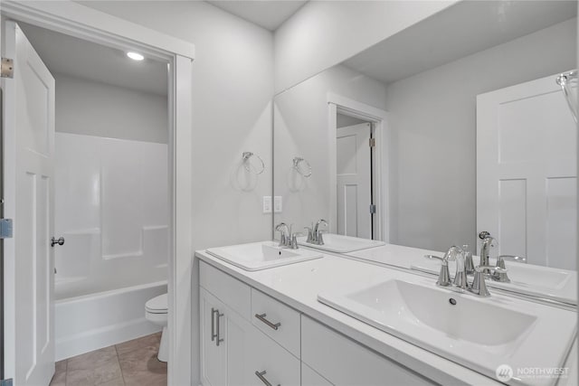 2609 S 7th Way, Ridgefield, WA 98642 - full bathroom featuring double vanity, toilet, and bathing tub / shower combination