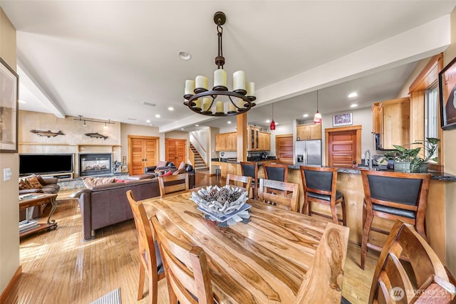 2659 Northshore Rd, Bellingham, WA 98226 - dining room featuring recessed lighting, stairway, light wood-type flooring, and a chandelier