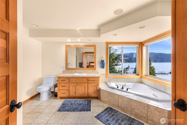 2659 Northshore Rd, Bellingham, WA 98226 - full bath featuring a garden tub, plenty of natural light, vanity, tile patterned flooring, and recessed lighting
