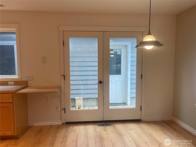 528 Chinook Way, Friday Harbor, WA 98250 - doorway to outside featuring french doors and light wood-style flooring