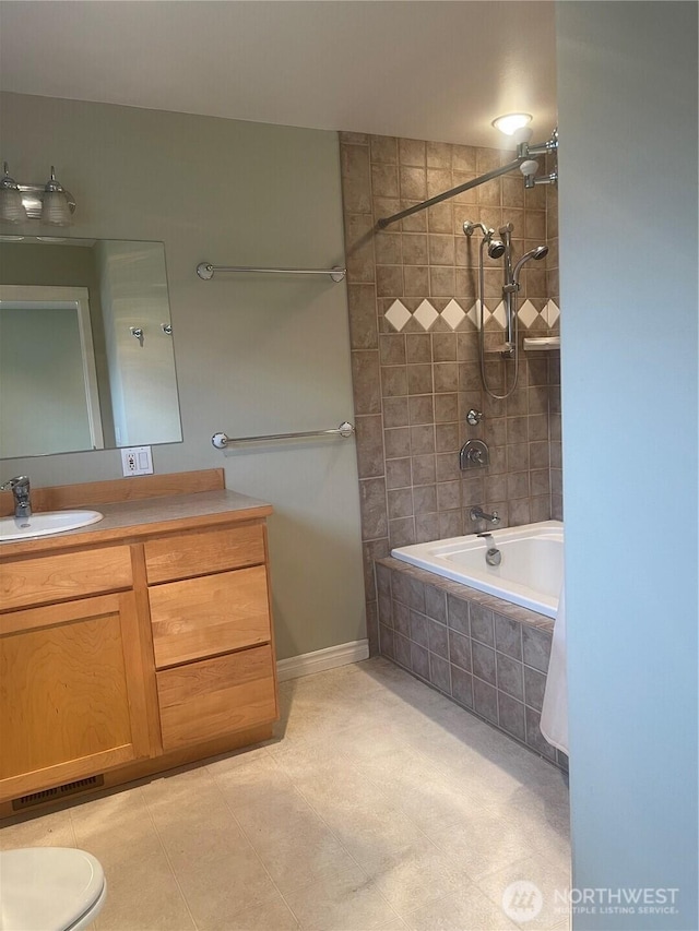 528 Chinook Way, Friday Harbor, WA 98250 - full bathroom with vanity, tiled shower / bath, and tile patterned floors