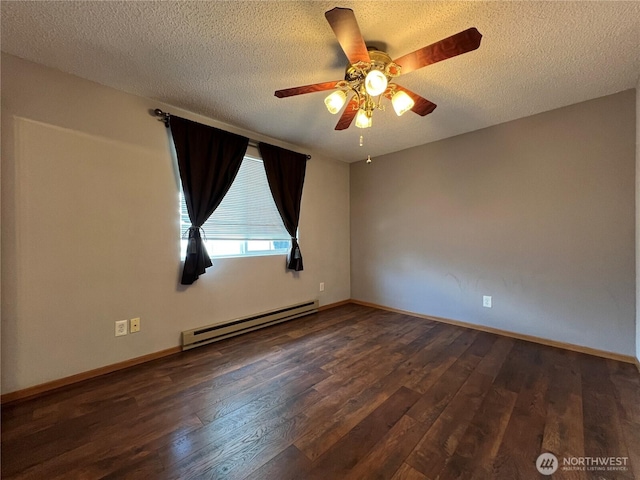 2116 E 65th St, Tacoma, WA 98404 - spare room with baseboard heating, a ceiling fan, wood finished floors, baseboards, and a textured ceiling