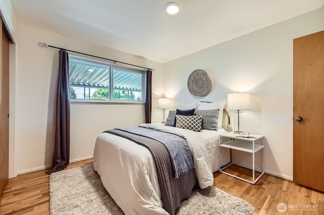 7924 S 112th St, Seattle, WA 98178 - bedroom with light wood-type flooring and baseboards
