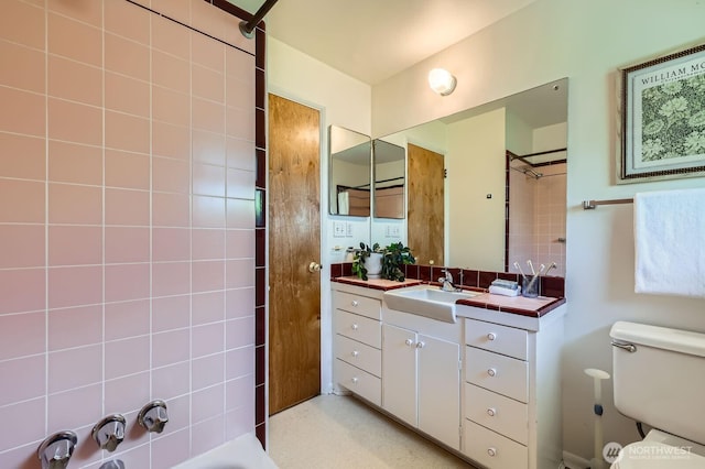 7924 S 112th St, Seattle, WA 98178 - bathroom featuring vanity, toilet, and tasteful backsplash