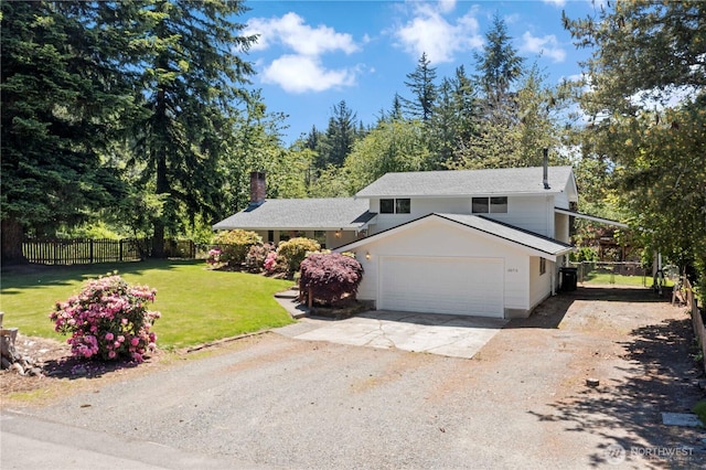 28713 SE 462nd Pl, Enumclaw, WA 98022 - tri-level home featuring concrete driveway, a garage, and a chimney