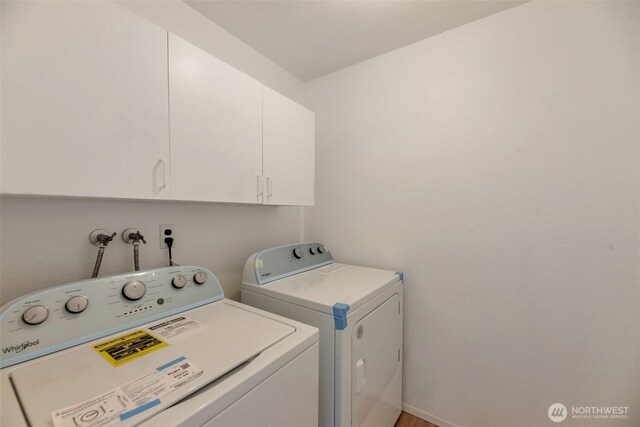 1702 C St SE, Auburn, WA 98002 - laundry area with cabinet space and washer and dryer