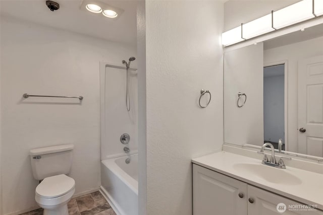 1702 C St SE, Auburn, WA 98002 - full bath with vanity, toilet, shower / tub combination, and baseboards