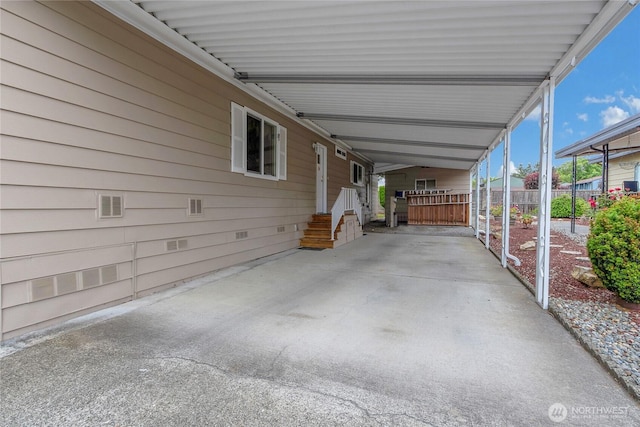 1402 22nd St NE Unit 47, Auburn, WA 98002 - view of patio with a carport