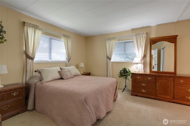 1402 22nd St NE Unit 47, Auburn, WA 98002 - bedroom featuring multiple windows and light carpet