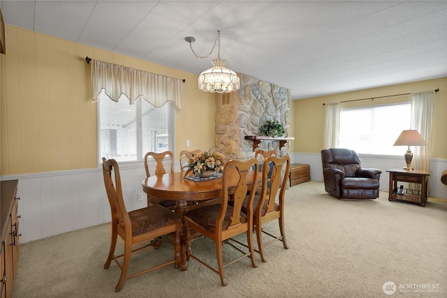 1402 22nd St NE Unit 47, Auburn, WA 98002 - dining area featuring carpet floors, plenty of natural light, and a chandelier