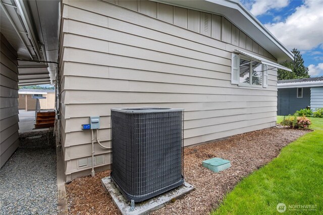 1402 22nd St NE Unit 47, Auburn, WA 98002 - exterior view of central AC