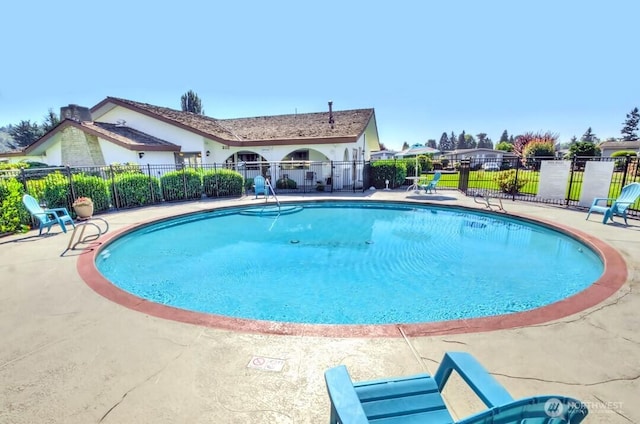 1402 22nd St NE Unit 47, Auburn, WA 98002 - community pool featuring a patio