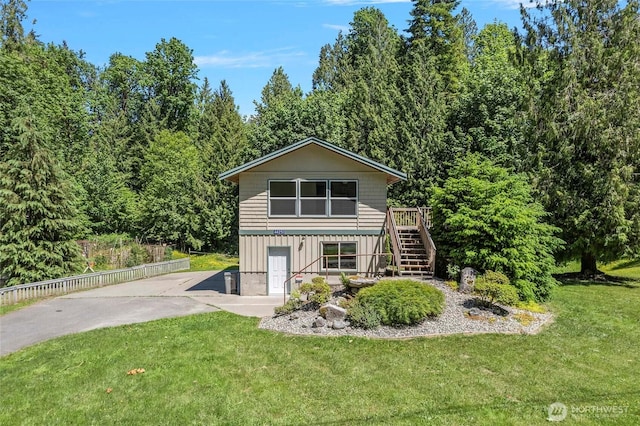 44251 Dalles Rd, Concrete, WA 98237 - view of front of property featuring stairs, a front lawn, a wooden deck, and driveway