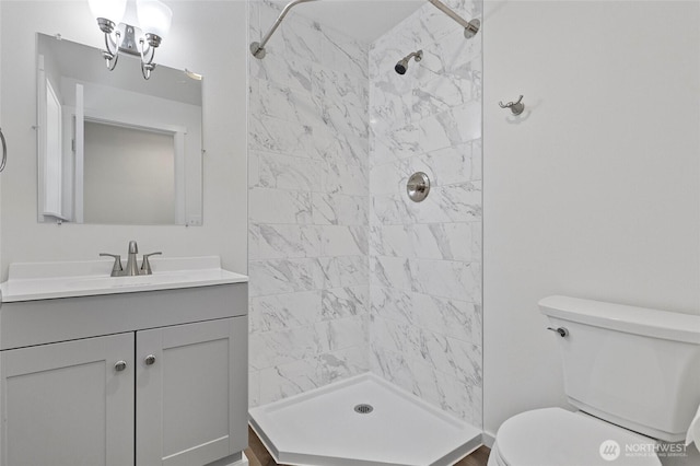 44251 Dalles Rd, Concrete, WA 98237 - full bathroom featuring toilet, vanity, and tiled shower
