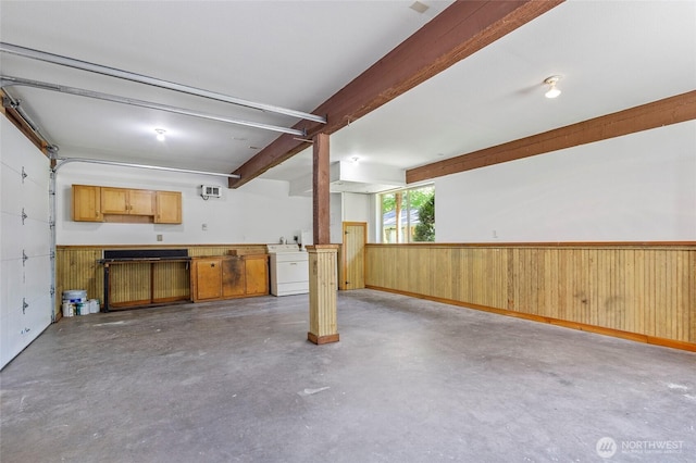 44251 Dalles Rd, Concrete, WA 98237 - garage featuring wood walls and wainscoting