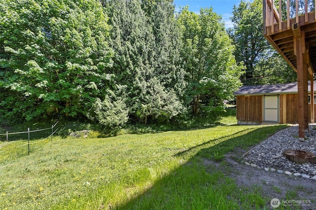 44251 Dalles Rd, Concrete, WA 98237 - view of green lawn with a wooden deck