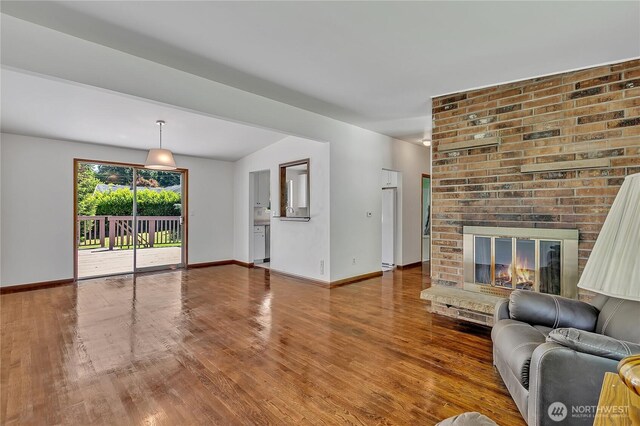 31006 38th Ave S, Auburn, WA 98001 - living area featuring wood finished floors, baseboards, and a fireplace