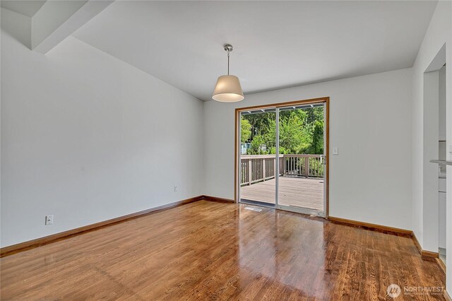 31006 38th Ave S, Auburn, WA 98001 - spare room with wood finished floors and baseboards