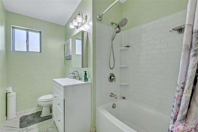 31006 38th Ave S, Auburn, WA 98001 - full bathroom featuring toilet, vanity, shower / bath combo, marble finish flooring, and baseboards