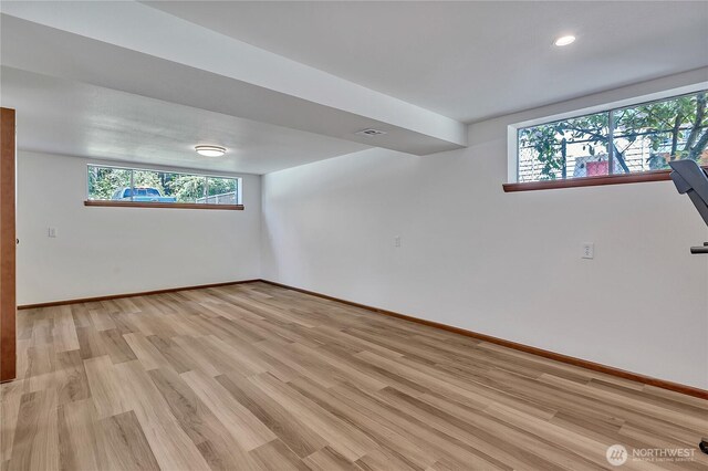 31006 38th Ave S, Auburn, WA 98001 - empty room with light wood finished floors, baseboards, healthy amount of natural light, and recessed lighting