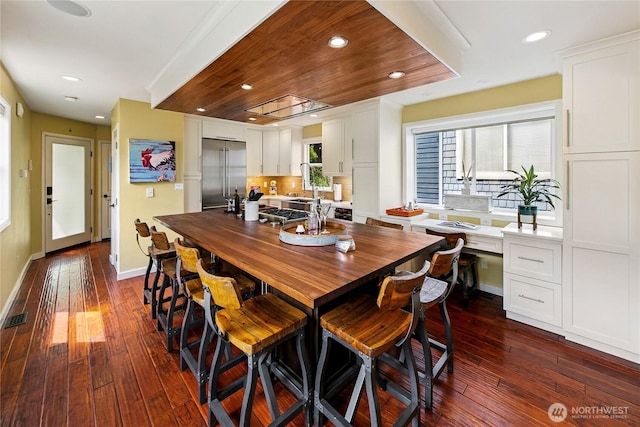 444 26th Ave E, Seattle, WA 98112 - dining area featuring recessed lighting, dark wood-type flooring, and healthy amount of natural light