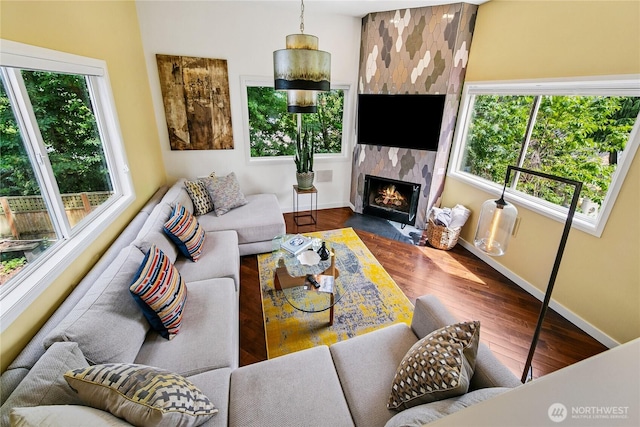444 26th Ave E, Seattle, WA 98112 - living area with plenty of natural light, wood finished floors, and a premium fireplace